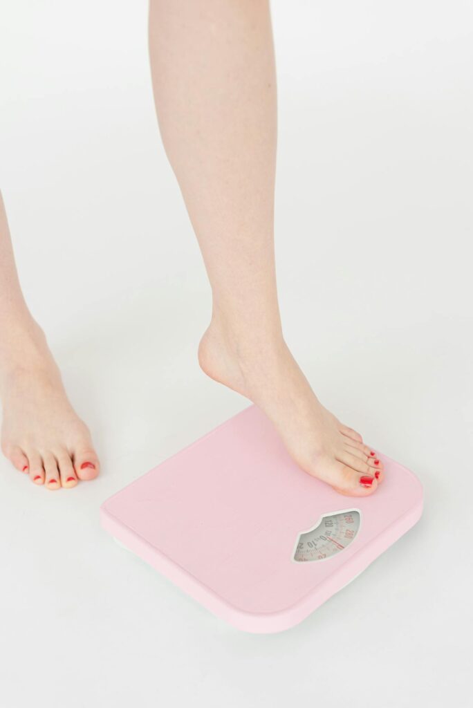 How to Beat the Weight Loss Plateau. scale picture 